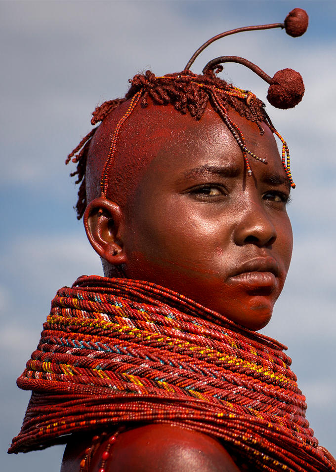 Kenyan woman with traditional jewelry and hair