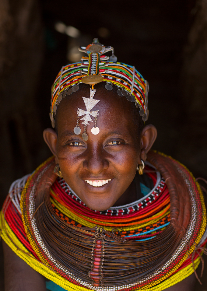 Kenyan woman with traditional headpiece and jewelry