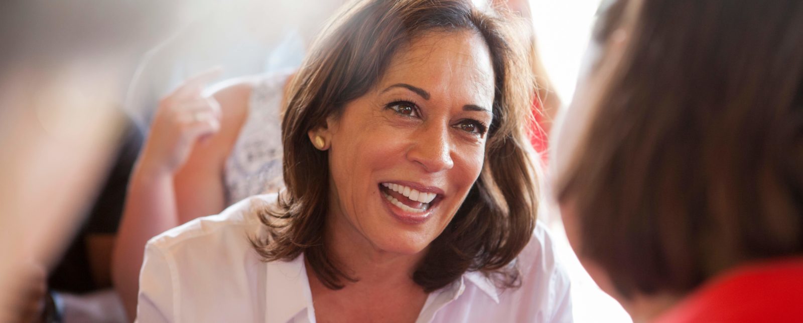 Kamala Harris speaking to a women in read