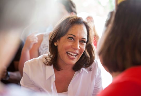 Kamala Harris speaking to a women in read