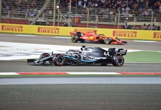 Black and blue race car on a race track