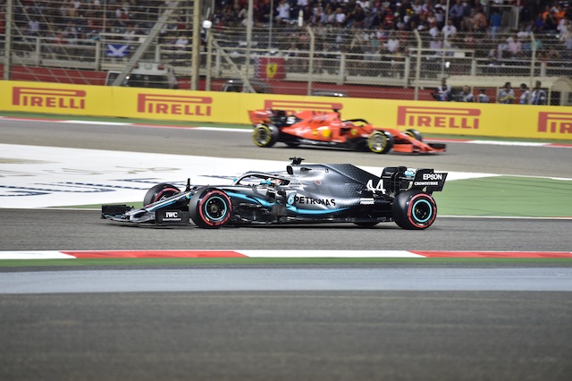 Black and blue race car on a race track