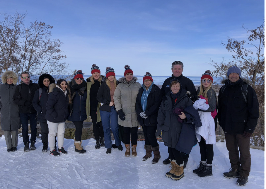 Team standing outside in the snow