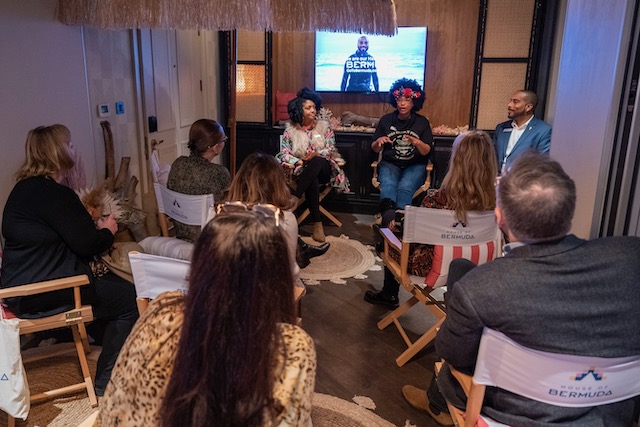 Bermuda House event with three people talking to an audience of 6